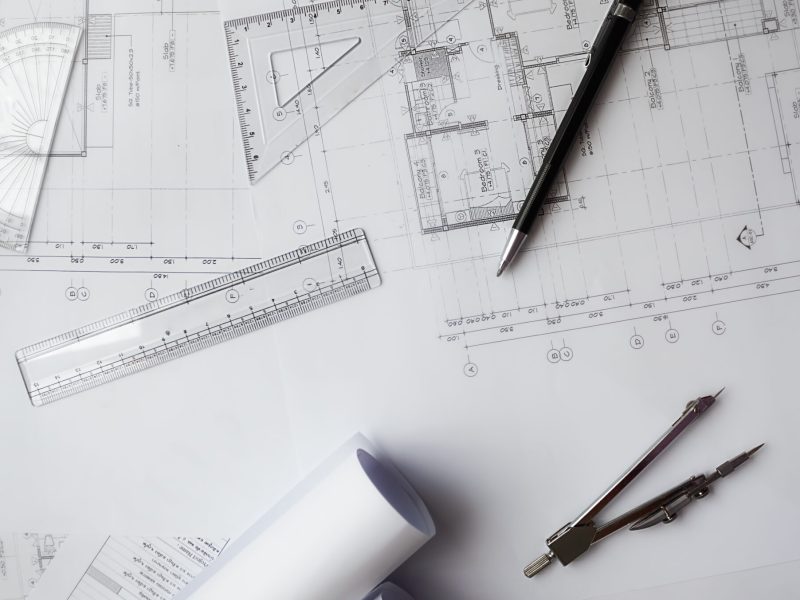 Image of engineering objects on workplace top view.Construction concept. Engineering tools.Vintage tone retro filter effect,soft focus(selective focus)